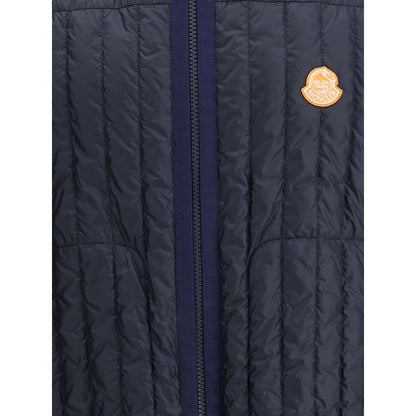 Close-up of Moncler x Donald Glover Blue Polyamide Sleveless Jacket showcasing vertical quilting and front zip closure.