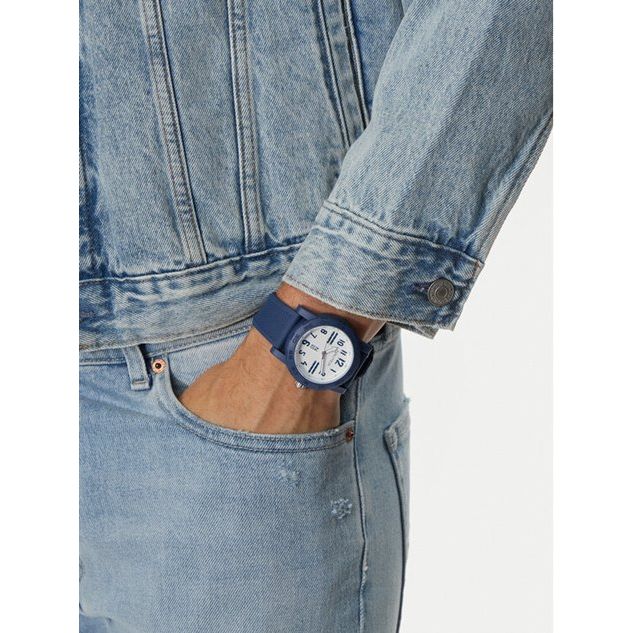 Gent wearing NAUTICA Mod. NAPATS301 watch with denim outfit; quartz analog, 5 ATM water resistant, 44 mm case.