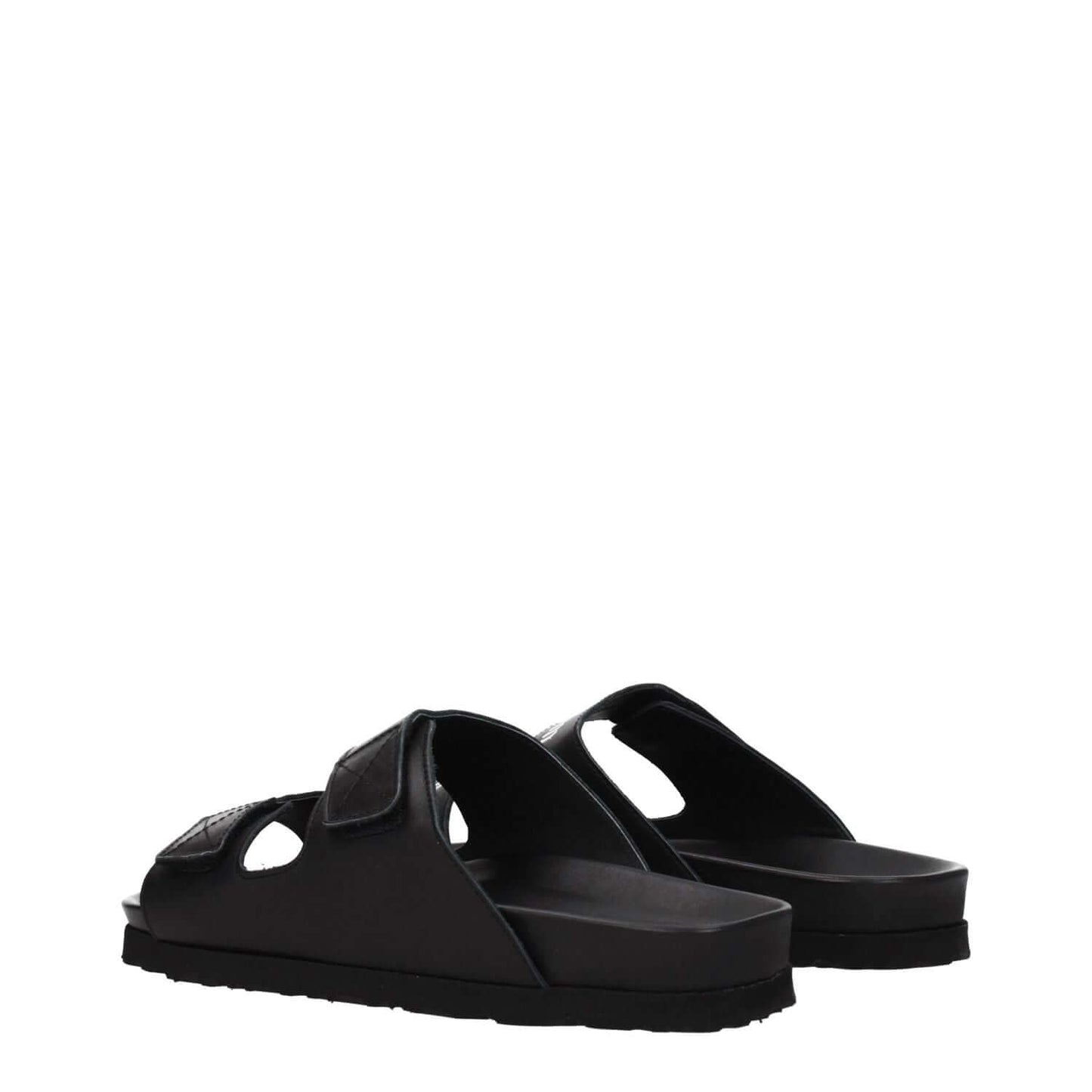 Palm Angels Black Leather Slippers with strap closure and open toe, side view showing low and flat heel.