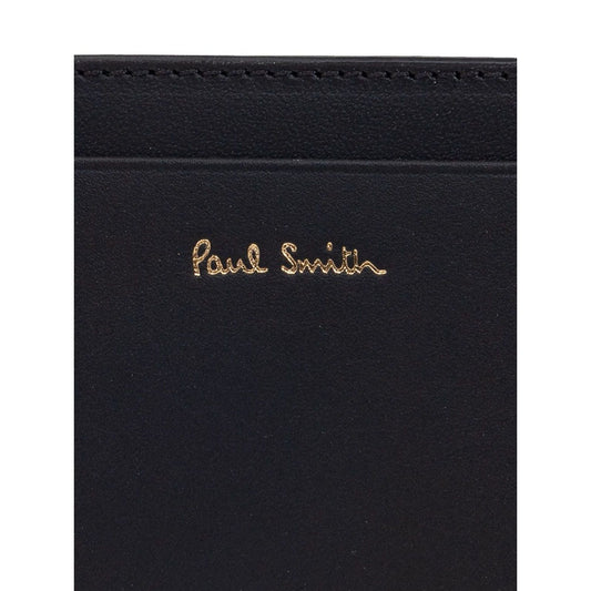 Paul Smith Signature Stripe leather card case with black card slots and logo stamp on front.