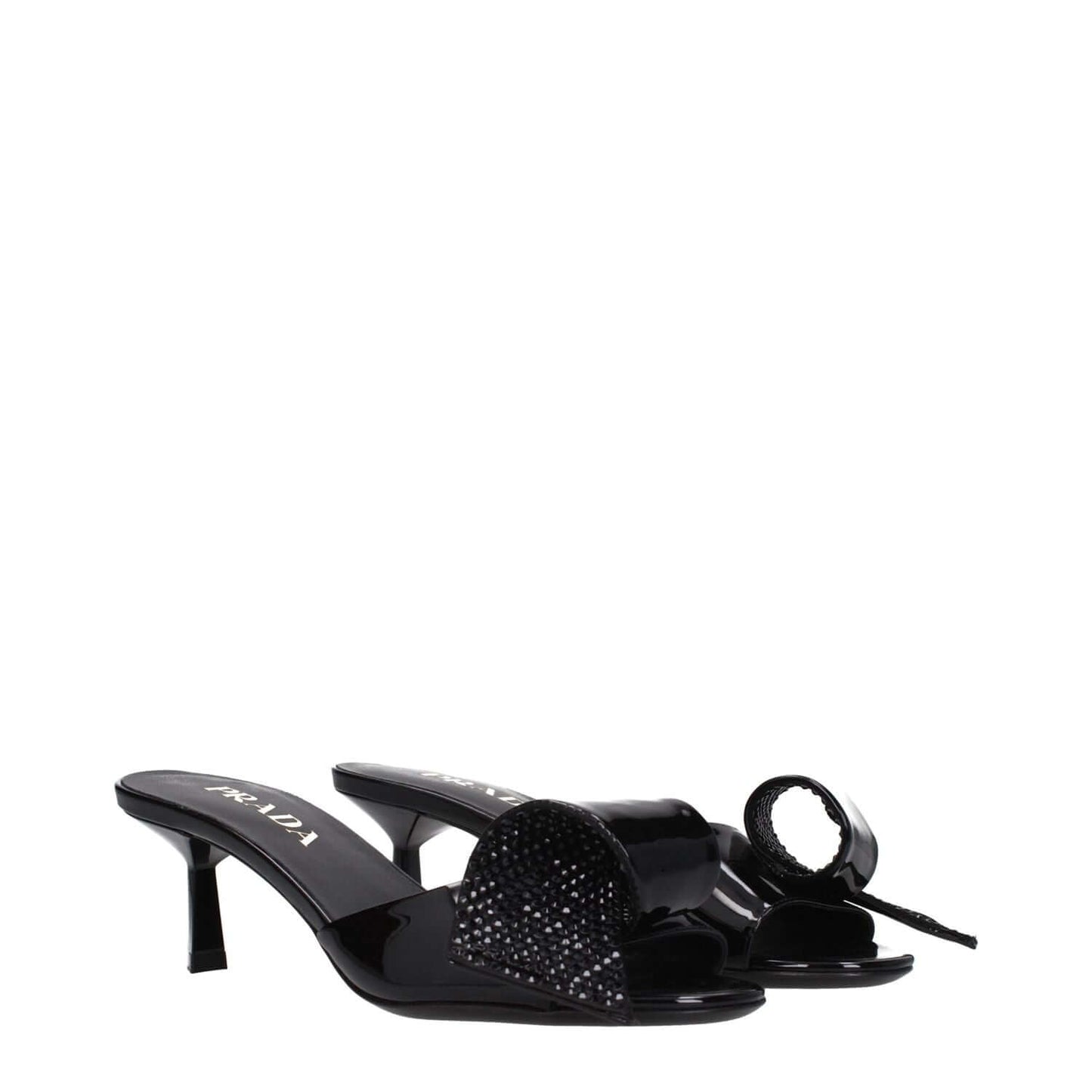 Prada Black Leather Sandals with mid heels, open toe, and front detail. Casual style perfect for elegant everyday wear.
