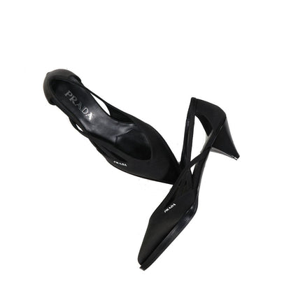 Prada Black Silk Mid Heel Pumps with pointed toe, cut-out detail, and branded insole, 100% silk, leather interior, made in Italy.