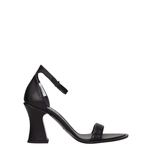 Premiata Black Leather Sandals in vintage style with open toe and buckle closure. High heel design for casual wear.