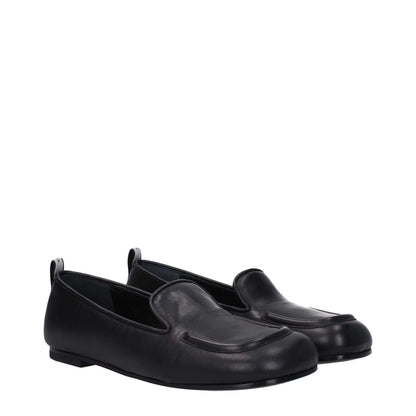 Premiata Black Leather Slip-On Loafers with round toe and logo on back, low flat heel, MPN PELLEM6705NERO, code F81424.