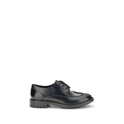 Side view of Saint Laurent Black Calf Leather Bos Taurus Oxfords And Derbies on white background, featuring smooth leather and rubber lug sole.