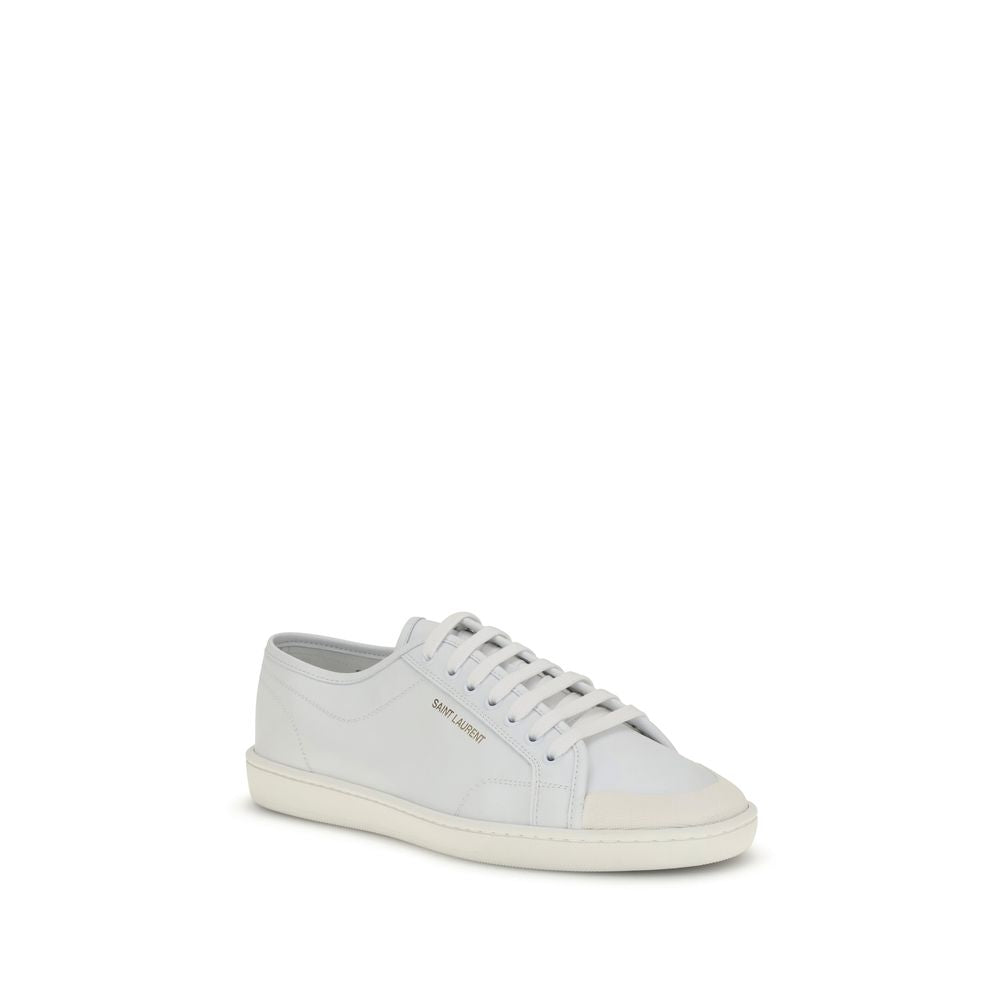 Saint Laurent White Calf Leather Bos Taurus Low Top Sneakers with gold logo and flat rubber sole on display