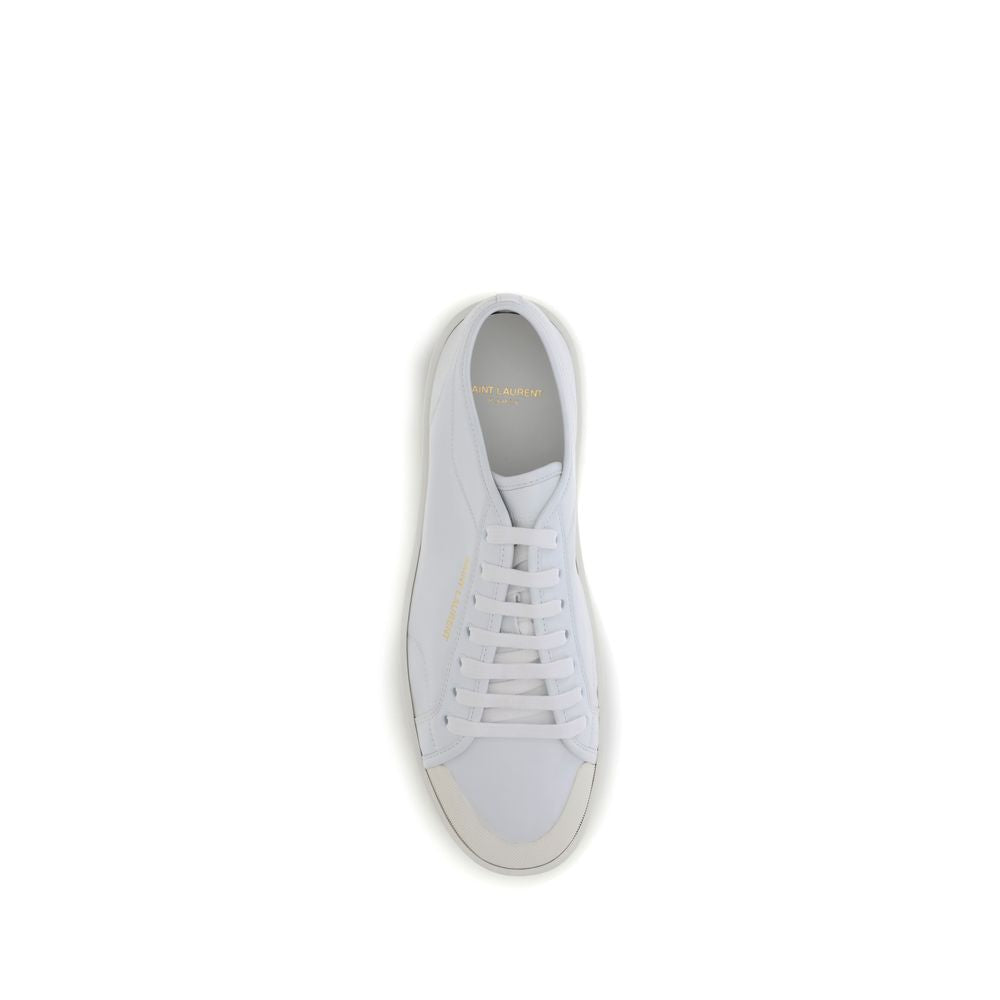 Saint Laurent White Calf Leather Bos Taurus Low Top Sneakers with lace-up closure and gold signature on flat rubber sole.