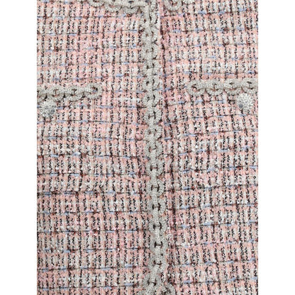 Close-up of Self-Portrait Multicolor Wool Coat with rhinestone trim and bouclé texture.