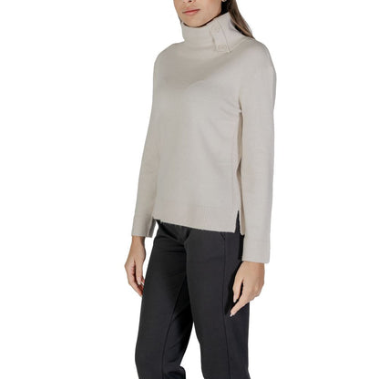 Woman wearing Street One Cream Viscose Turtleneck with stylish side button details, showcasing a refined and versatile look for cooler days.