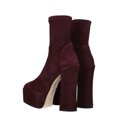 Stuart Weitzman Purple Leather Ankle Boots with high heels, suede material, round toe, and leather sole, style for casual wear.