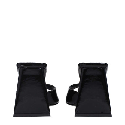 Rear view of The Attico Black Leather Stiletto Heel Sandals in patent leather with mid heels and open toe design.