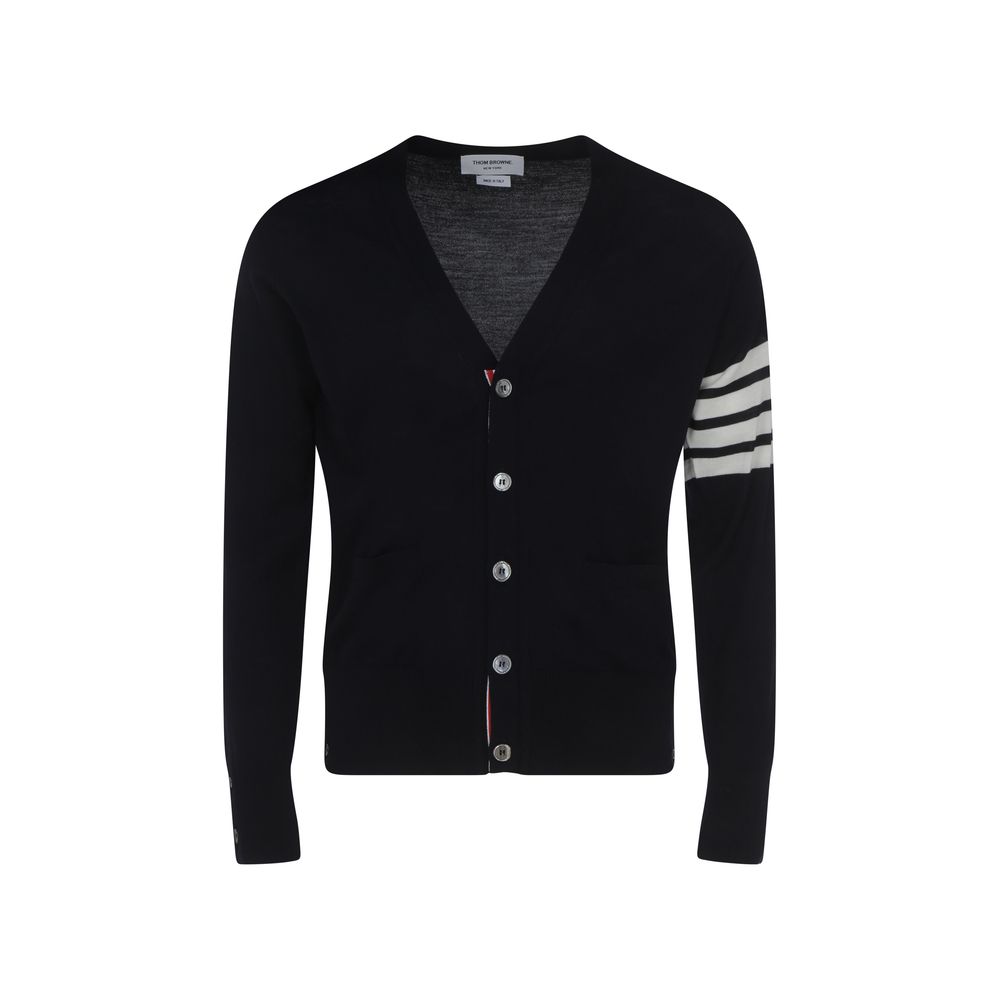 Thom Browne Cardigan, fleece wool with striped cuffs, ribbed hem, V-neck, button closure, patch pockets, logo bands on left arm