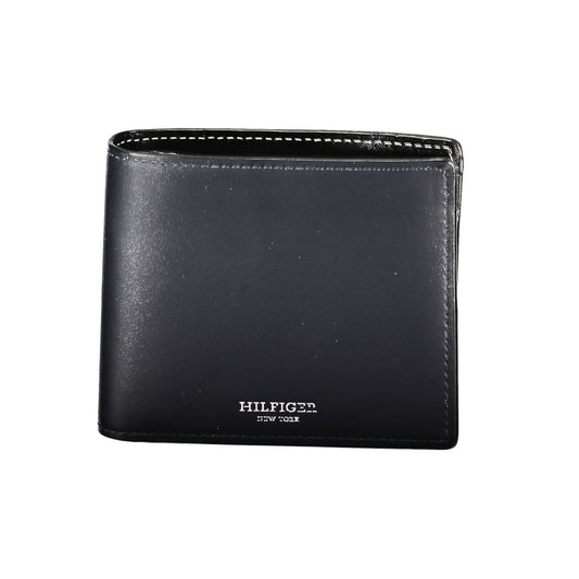 Tommy Hilfiger Blue Leather Wallet with two compartments, coin purse, card holder, contrast details, and logo.