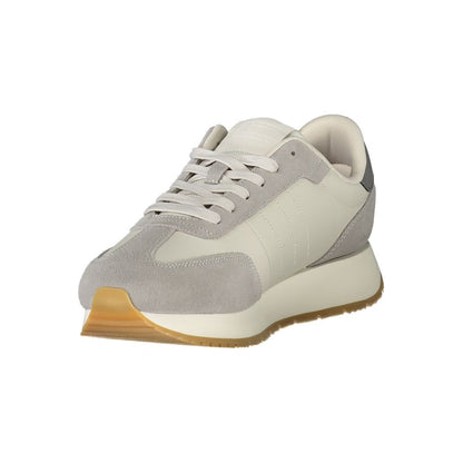 Stylish gray and white casual sneaker with gum sole, showcasing modern design and comfort.