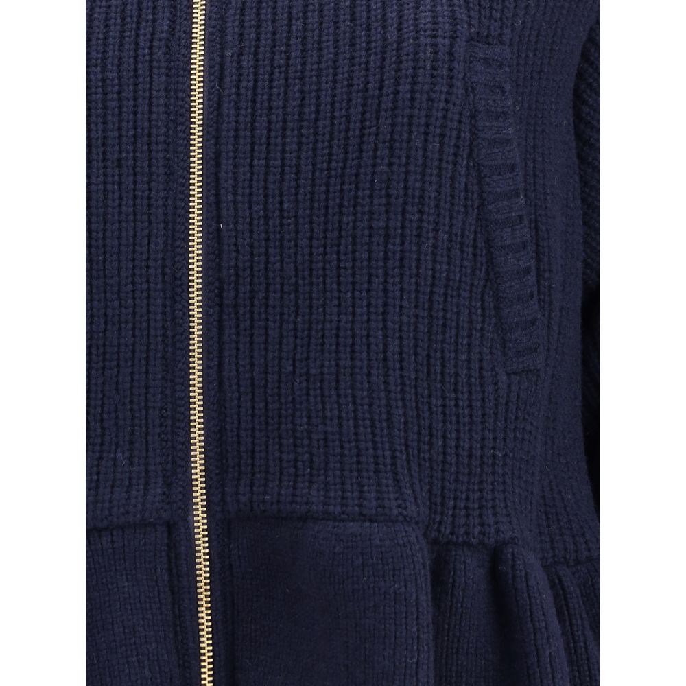 Undercover Blue Wool Bomber close-up showing flared hem and textured wool fabric with front zipper detail for AW25 collection.