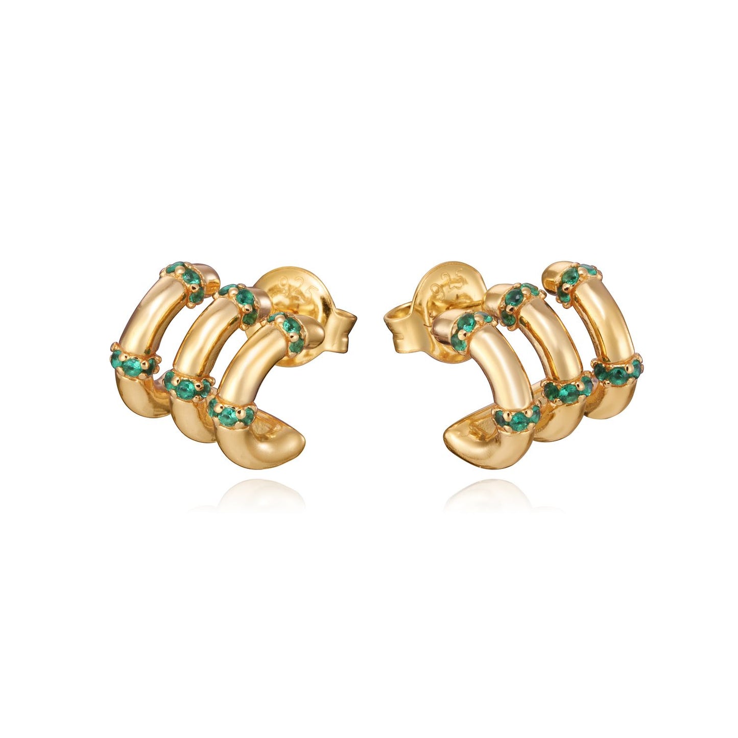 Gold and emerald hoop earrings with unique design, perfect for elegant occasions. Fashion jewelry highlighting style and luxury.