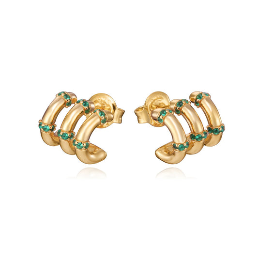 Gold and emerald hoop earrings with unique design, perfect for elegant occasions. Fashion jewelry highlighting style and luxury.