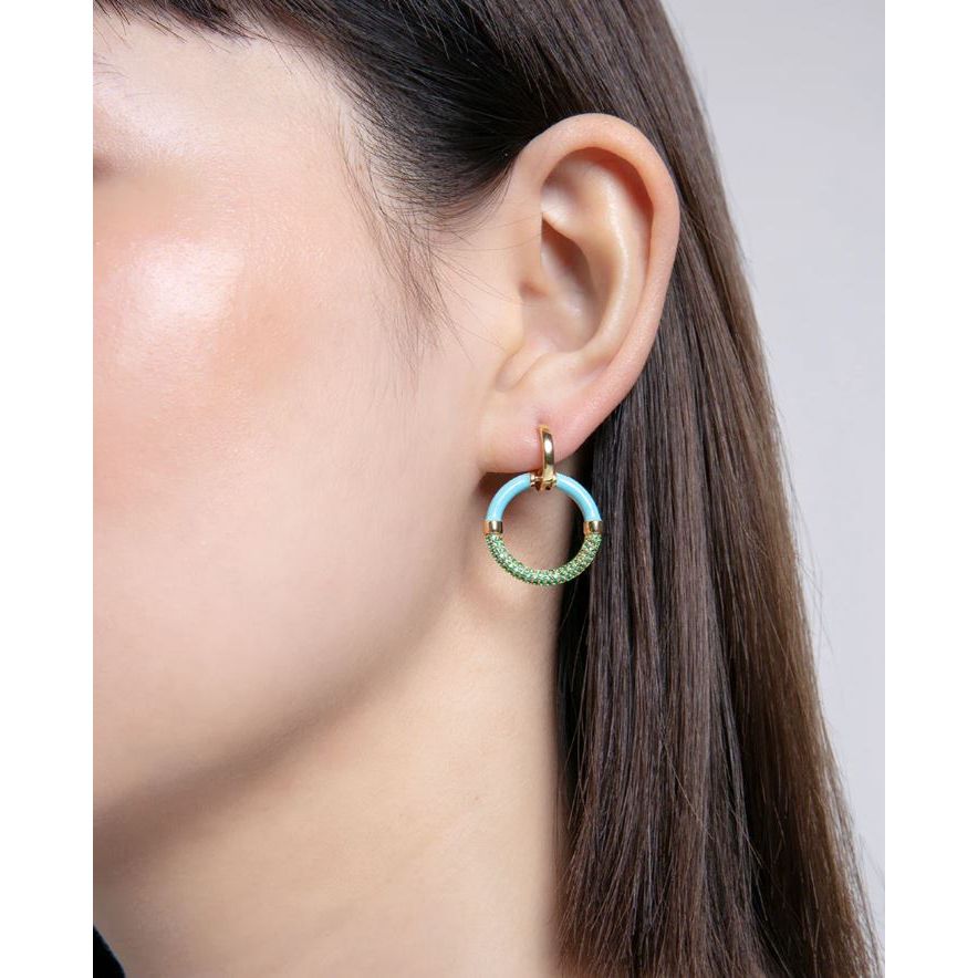 Close-up of lady wearing VICEROY JEWELS Mod. 13199E100-99 earrings with quartz analog movement, 10 ATM water resistance, in silver 925°.