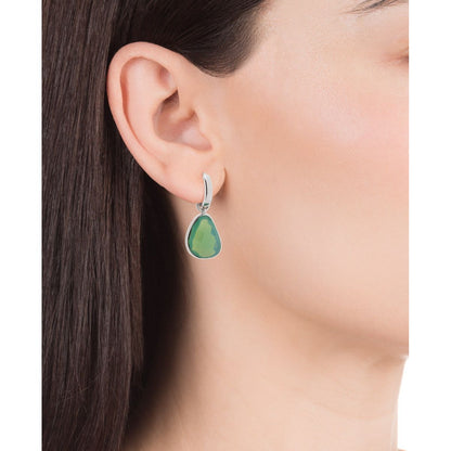 Woman wearing VICEROY JEWELS Mod. 15108E000-38 earrings in silver with green stone detail, emphasizing elegant ladies' fashion accessory.