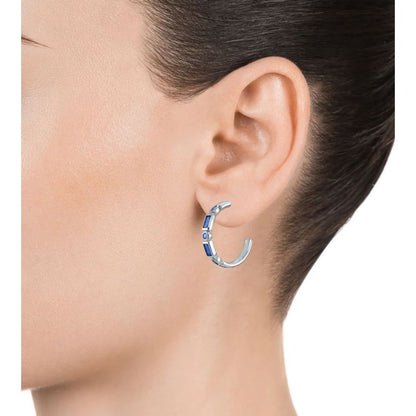 Lady wearing VICEROY JEWELS Mod. 9121E000-33 silver earrings, showcasing elegant design in official packaging. Water resistant 5 ATM.