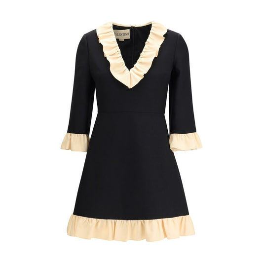 Valentino Black Fleece Wool Cocktail Dress with V-neckline, three-quarter sleeves, and voile detail for elegance in AW25 collection.