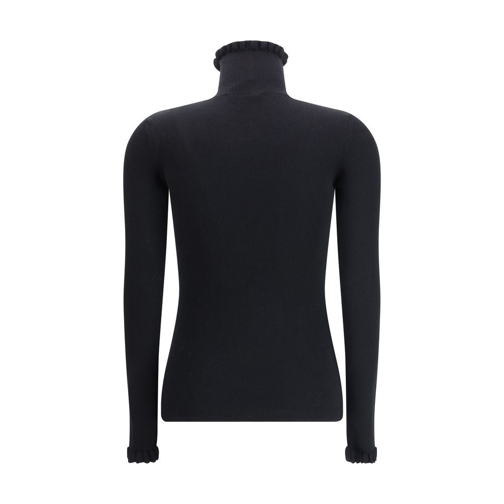 Back view of Valentino Black Fleece Wool Sweatshirt with ruffled collar and cuffs, showcasing slim fit and sophisticated design.