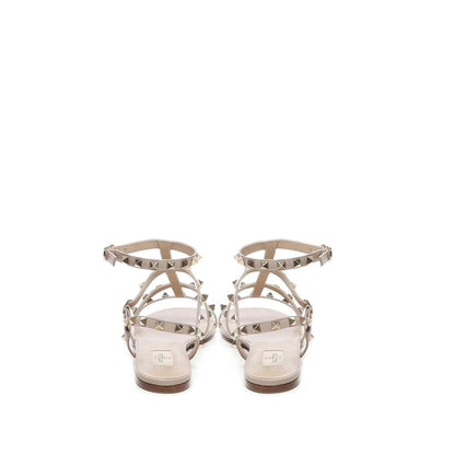 Back view of Valentino Garavani Beige Calfskin Sandals with gold-tone rockstud embellishments and ankle buckle fastening.
