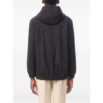 Back view of Valentino Nylon Hooded Jacket with VLogo Patch in navy blue, showcasing the classic hood and relaxed fit fashion.