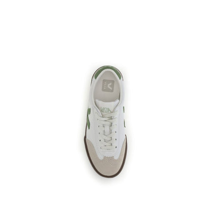 Top view of Veja White Leather Low Top Sneakers with a green logo, inspired by 1970s Brazilian volleyball shoes, featuring lace-up closure.