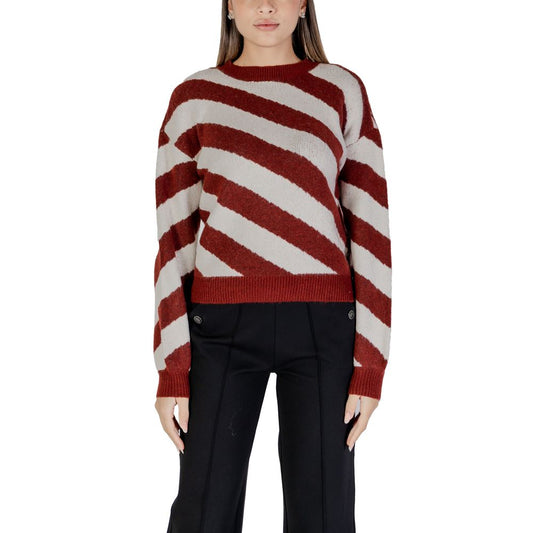 Vero Moda Bordeaux Recycled Polyester Sweater worn by a woman, featuring a red and white striped pattern, perfect for fall/winter.