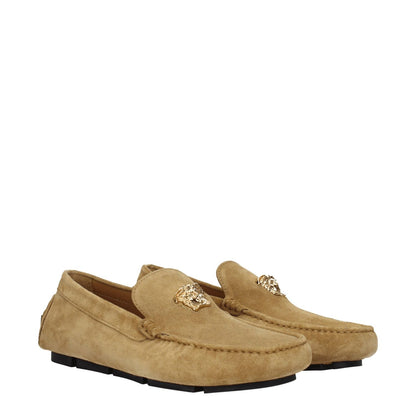 Versace Beige Leather Slip-On Loafers with gold logo, casual suede design, round toe, leather sole, perfect for versatile style.