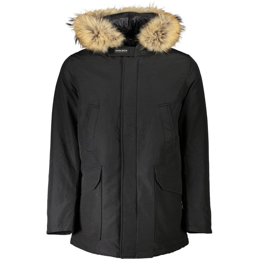 Woolrich Black Cotton Men Jacket with removable fur-trimmed hood, featuring four pockets, sleek zip and button closure.