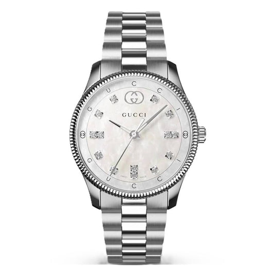 GUCCI MOD. G-TIMELESS SLIM luxury watch with silver bracelet and diamond markers on white dial.