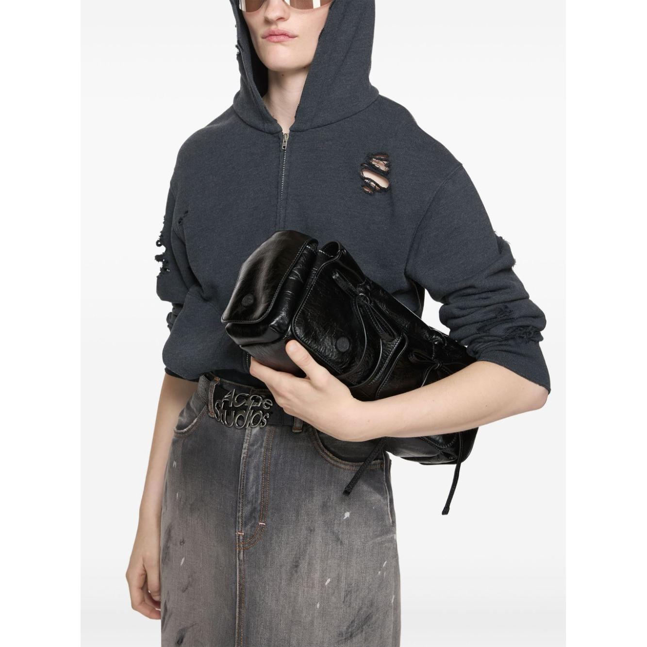 Front view with bag zipped and handles upright.
